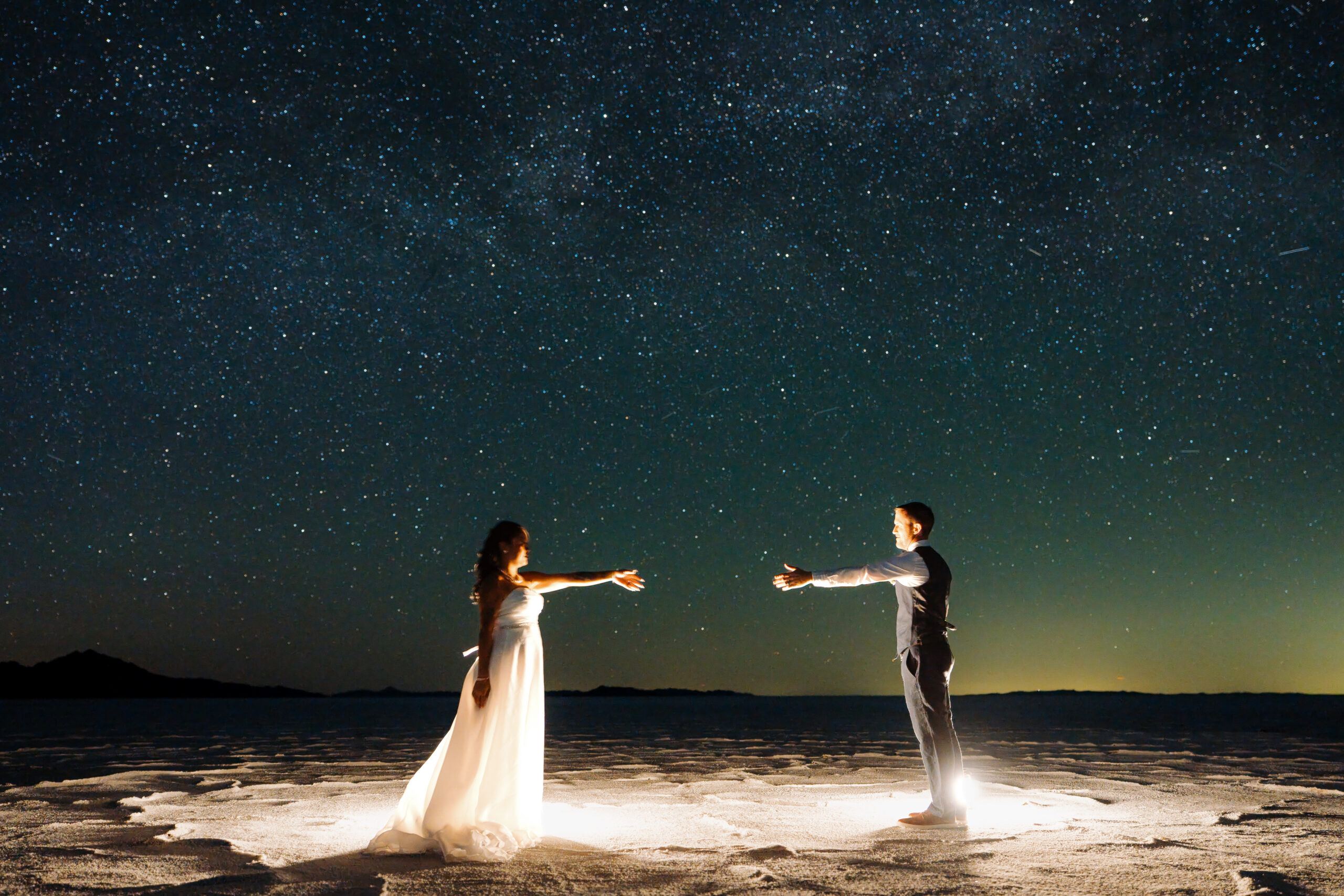 Elopement couple with stars at Bonneville Salt Flats in Utah