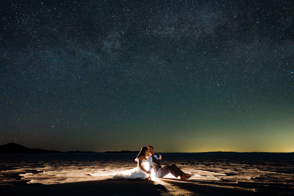 Elopement couple with stars at Bonneville Salt Flats in Utah